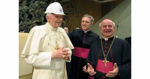 Benedict XVI wears a worker hat 1